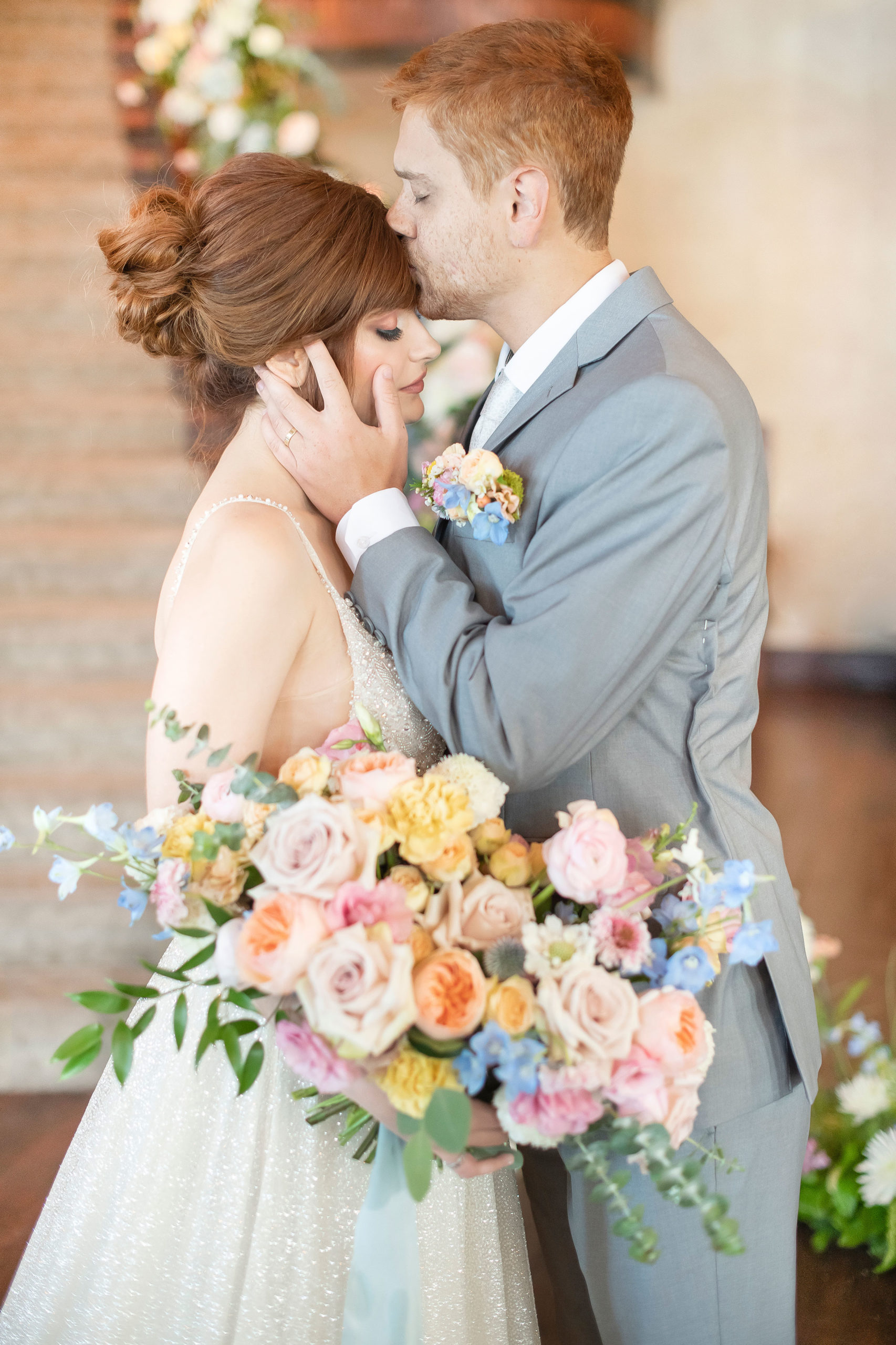 pastel wedding theme-forehead kiss-wedding portraits-utah wedding-wadley farms-castle wedding-lindon utah