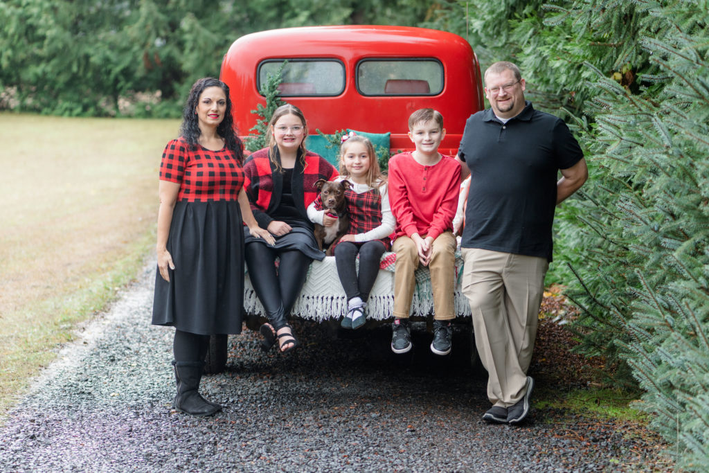 Family of five after raining for family holiday photos in Oregon